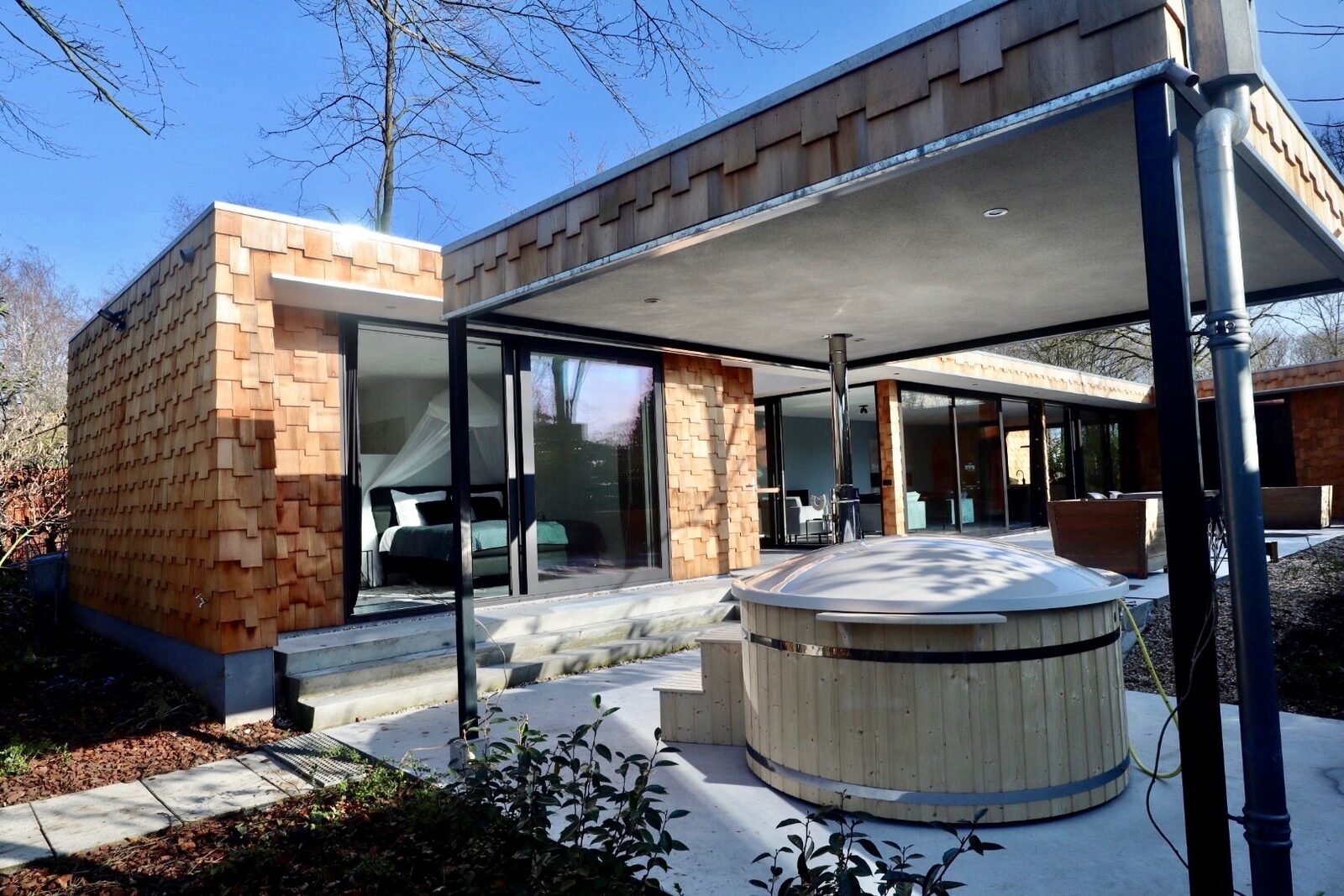Houten Boshuis - luxe wellness vakantiehuis met hottub