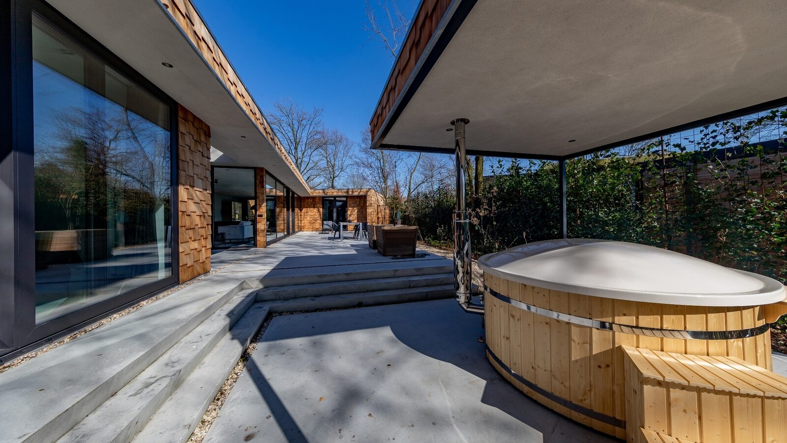 Houten Boshuis - luxe wellness vakantiehuis met hottub
