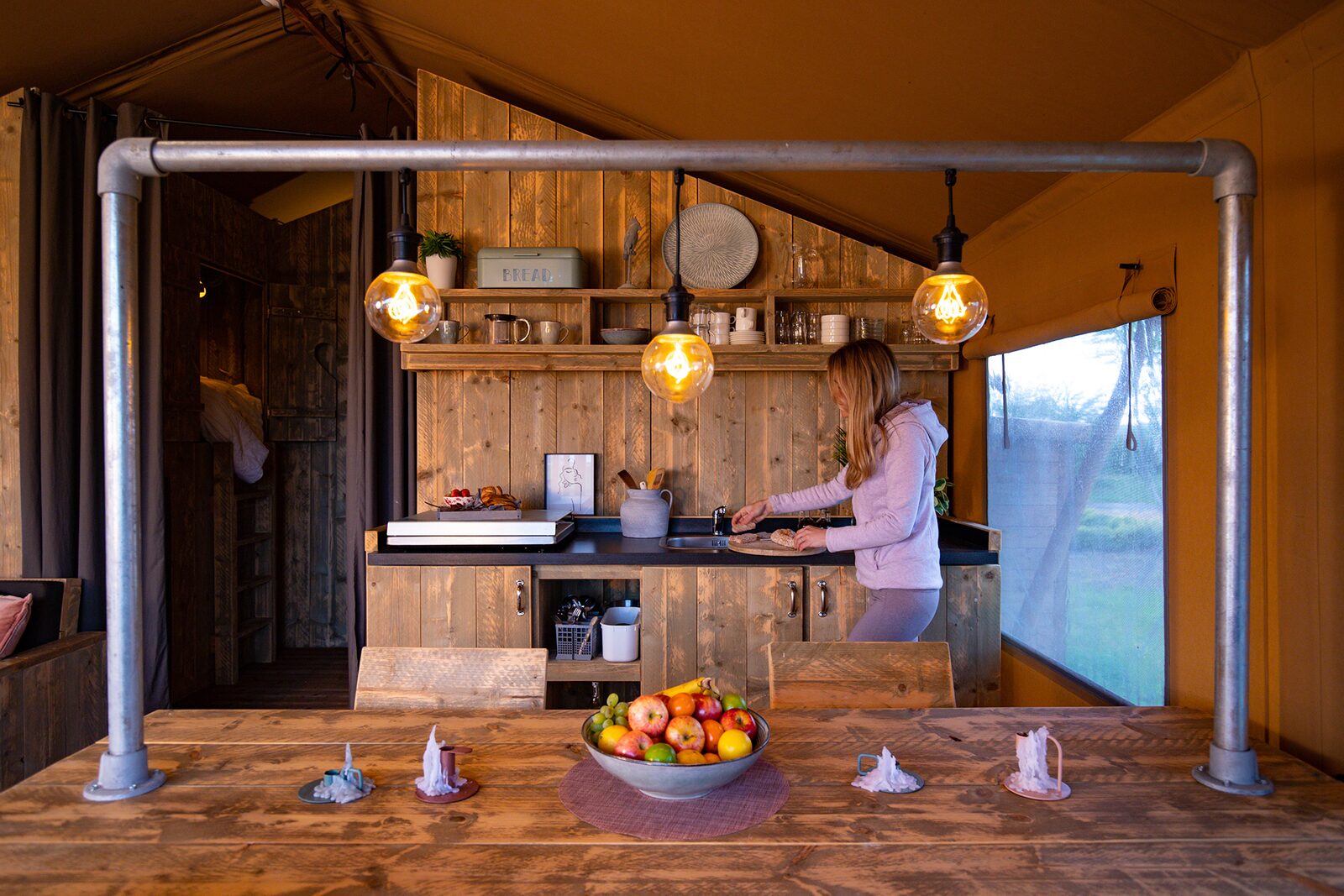 Group accommodation: group tent + four 6-person luxury glamping tents (24 people)