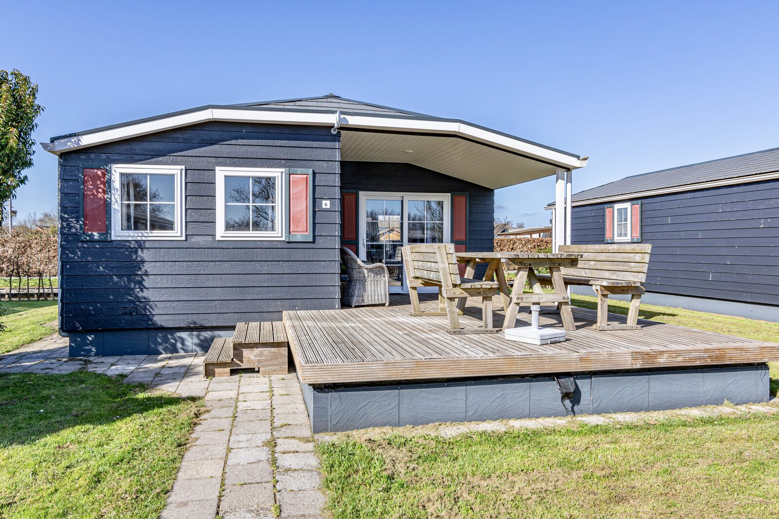 Chalet "De Grote Belter" four guests with a wooden porch