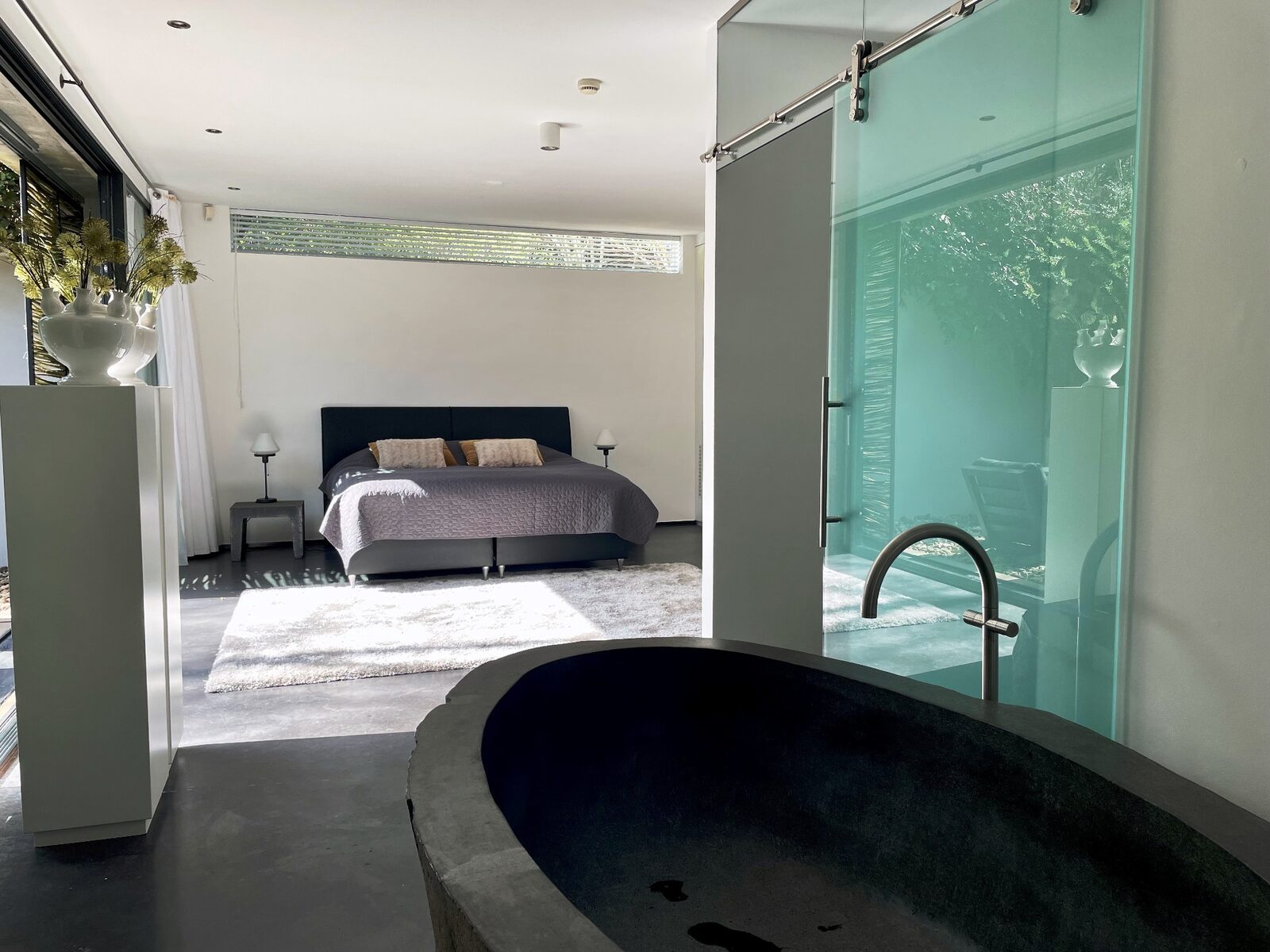 Betonnen Boshuis - luxe wellness vakantiehuis in Brabant