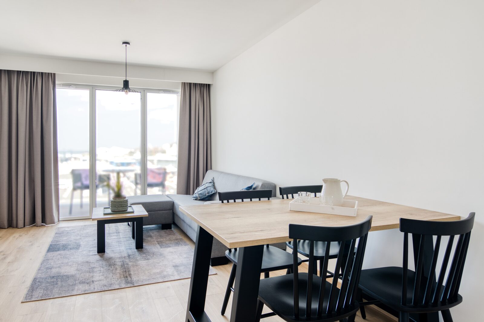 Suite voor 4 pers met tweepersoonsbed & 2 enkele bedden en balkon