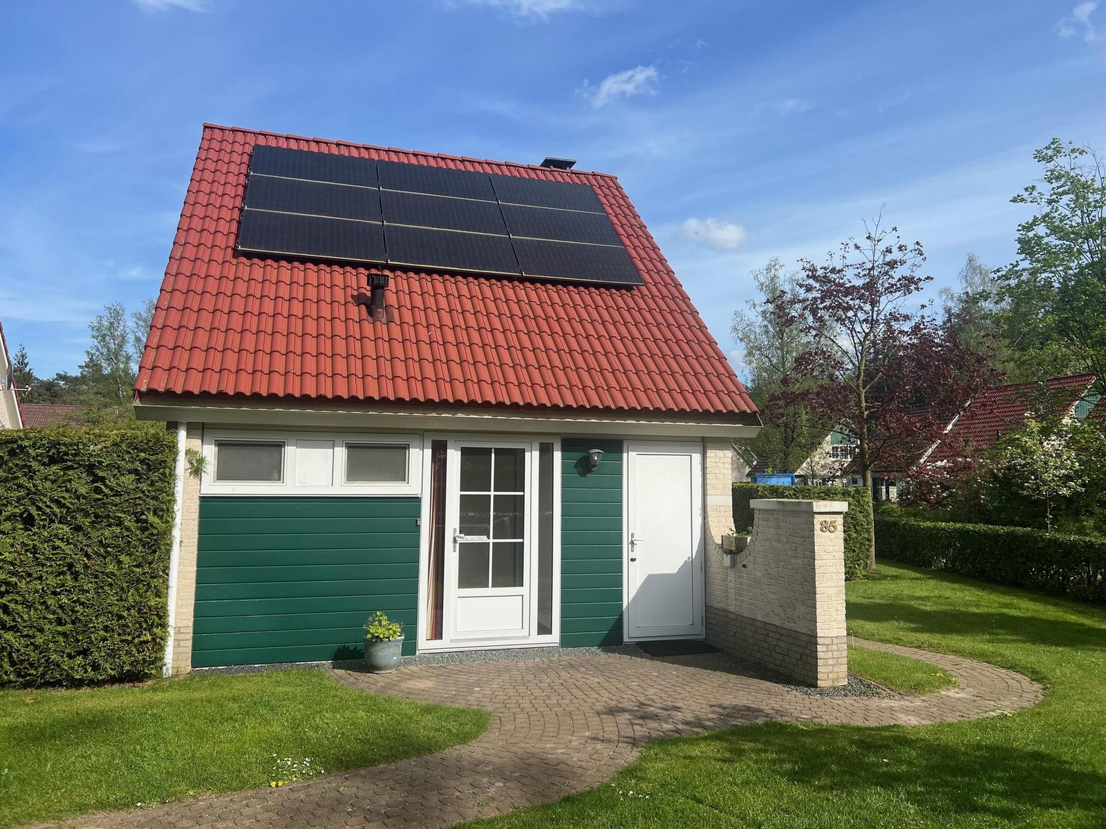 Bungalow met luxe tuinkamer en uitzicht op speelvijver - 5 personen