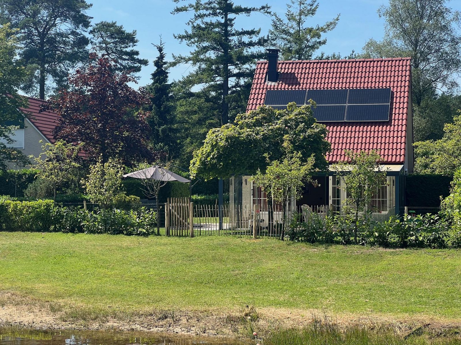 Bungalow met luxe tuinkamer en uitzicht op speelvijver - 5 personen