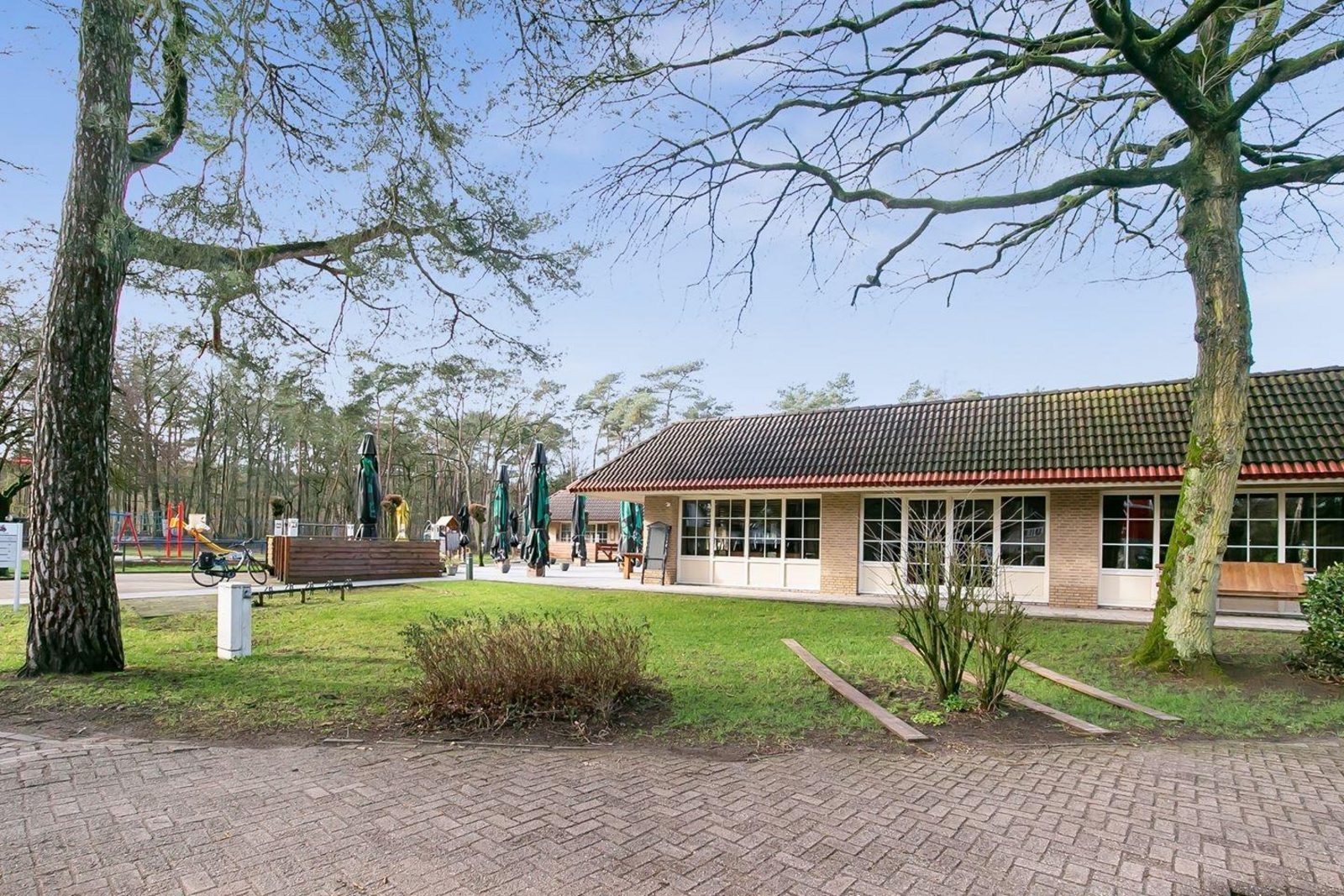 Bungalow met luxe tuinkamer en uitzicht op speelvijver - 5 personen