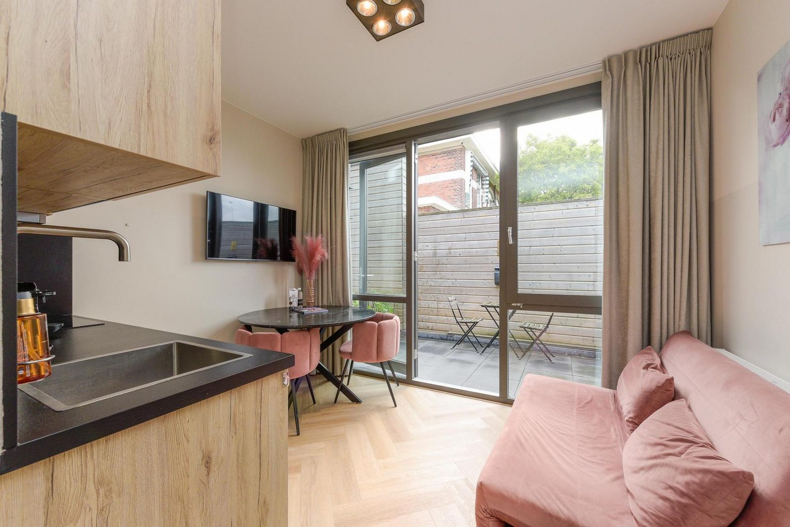 Novallure Hofvliet Short Stay Apartments - Studio met buitenruimte - Achterzijde