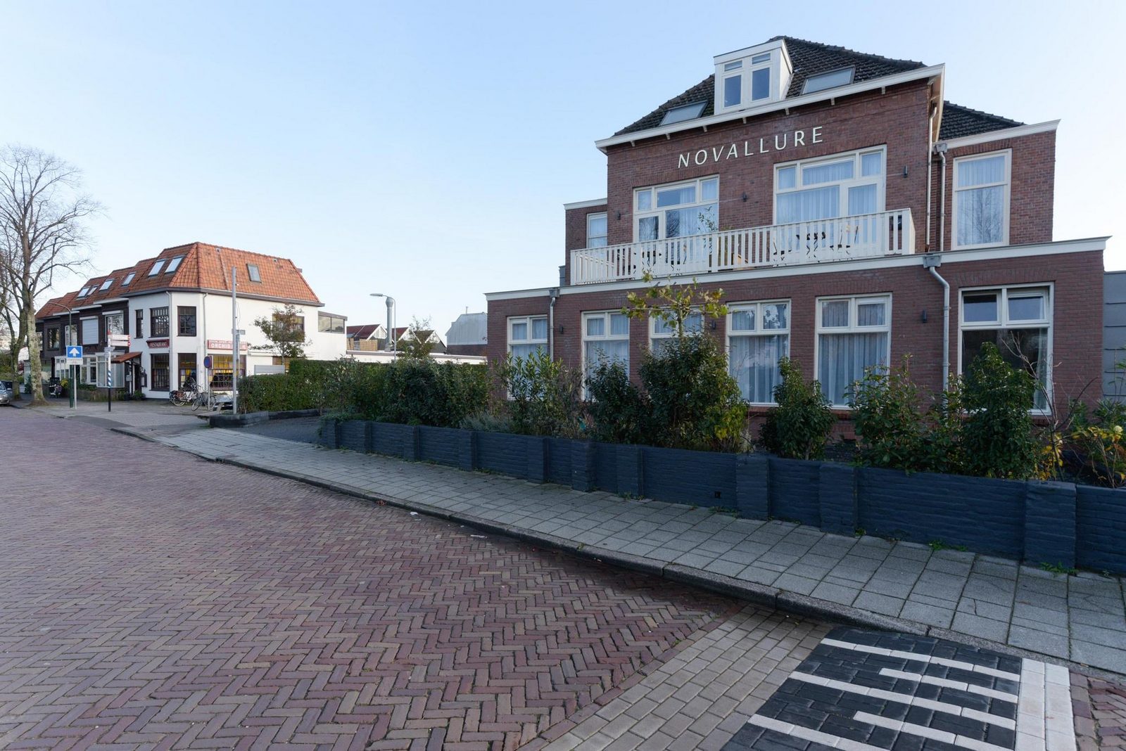 Novallure Hofvliet Short Stay Apartments - Grote studio met buitenruimte - Achterzijde