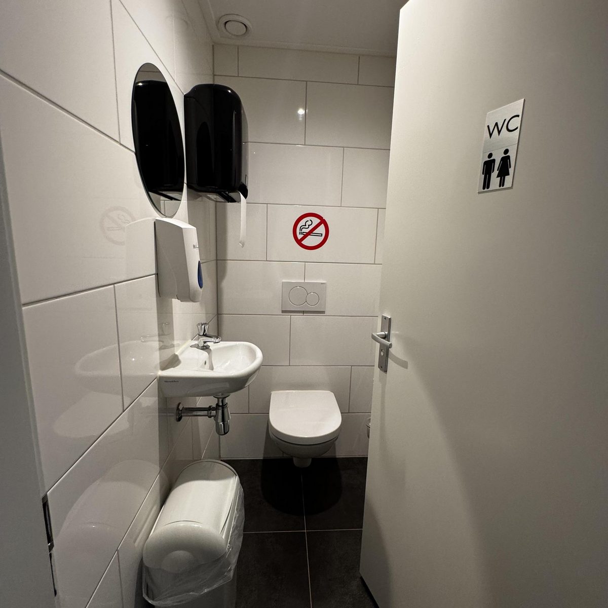 Single room with shared bathroom facilities in the hallway