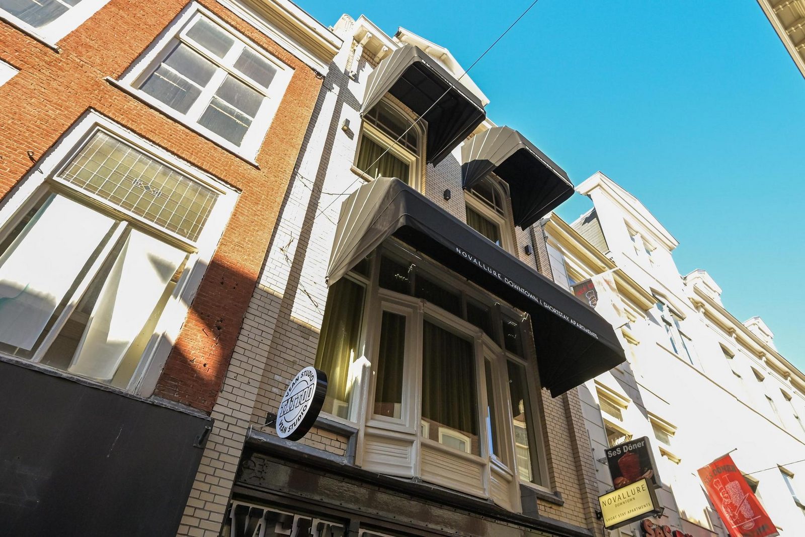 Novallure Downtown - Luxe suite met buitenruimte