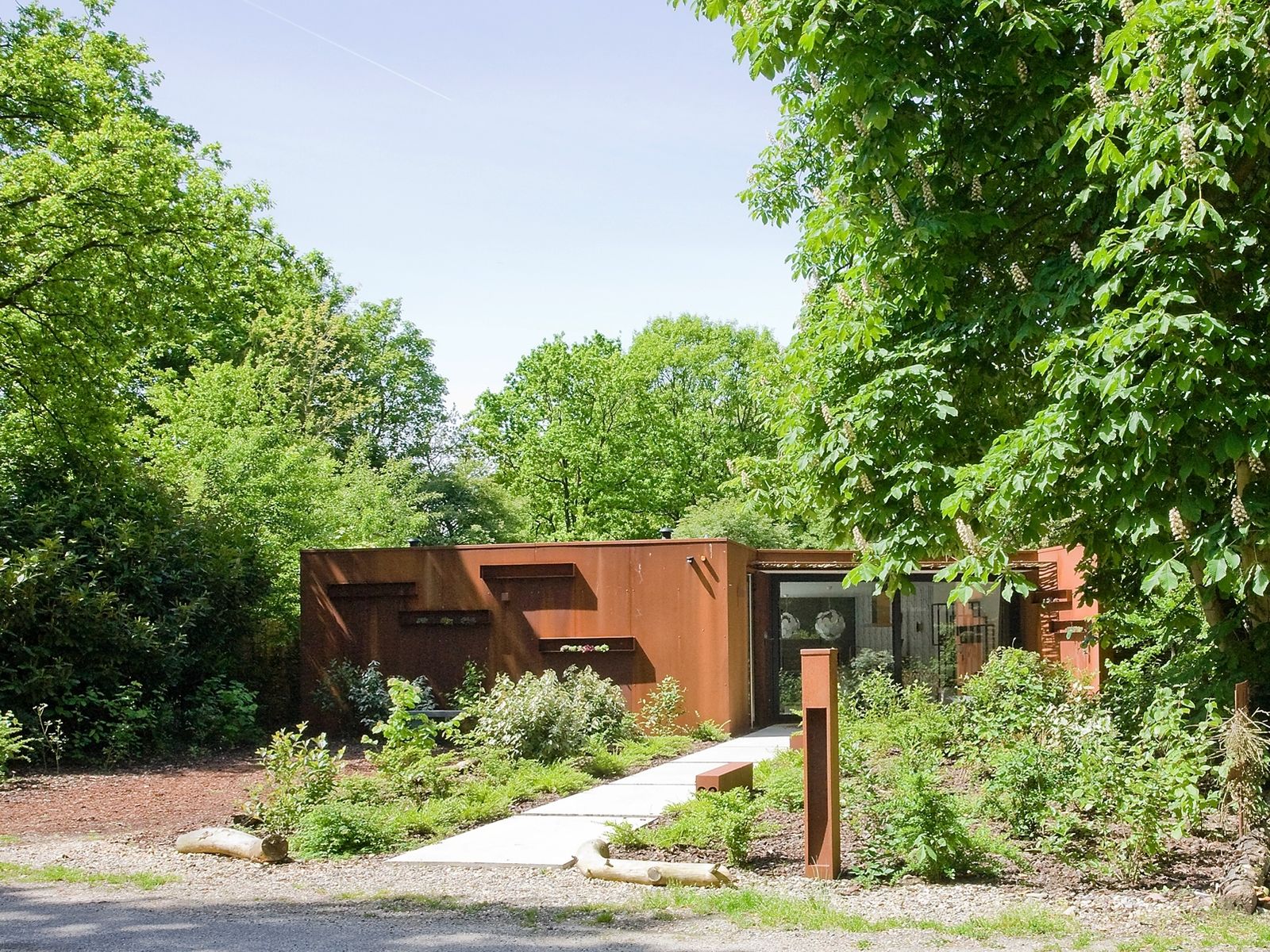 Vakantievilla met moderne inrichting op landgoed Bergvliet, vlakbij Breda. Golf, wellness en Bourgondische gezelligheid.