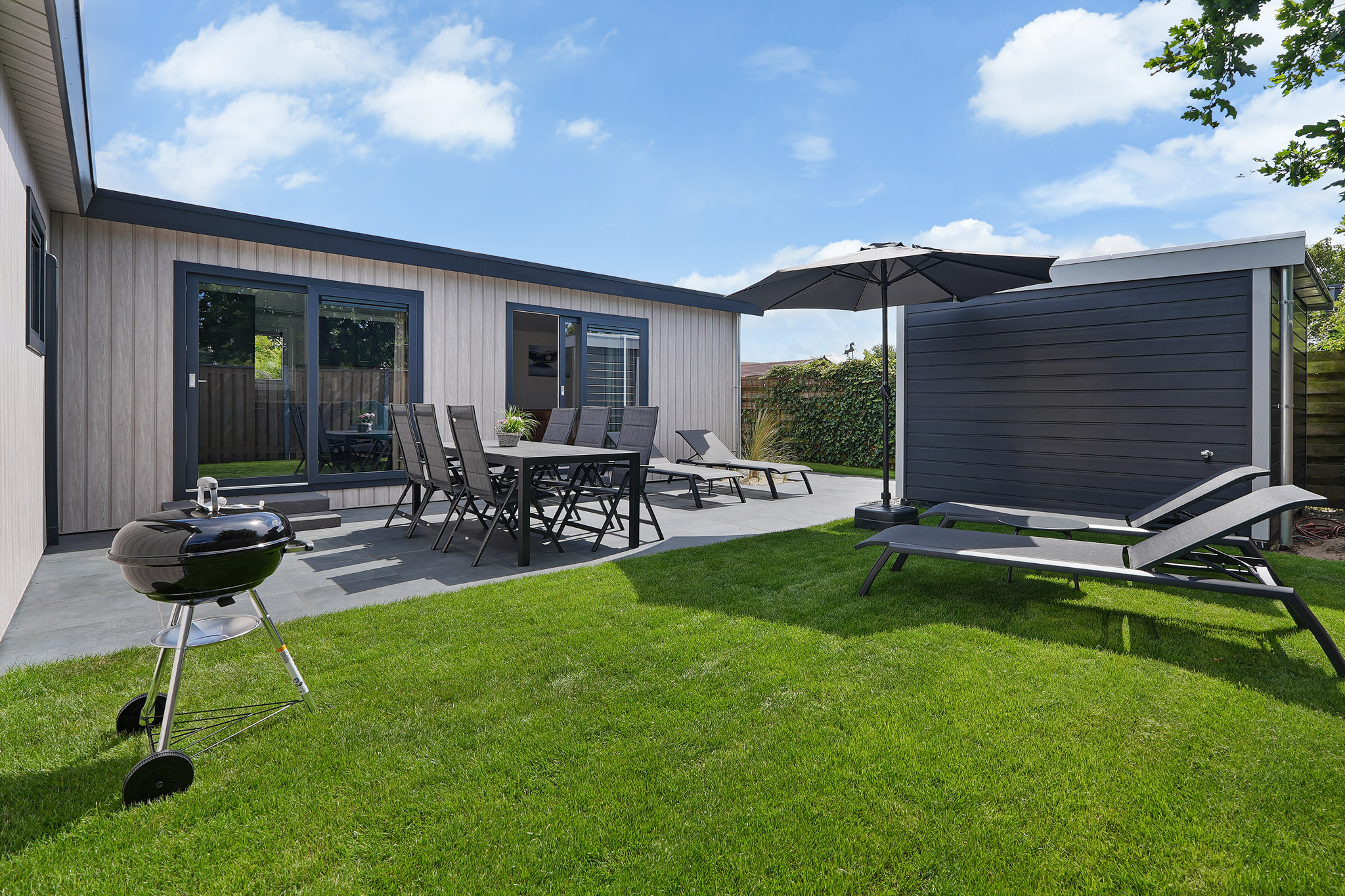 Gemütliches Chalet 6 personen, großem Garten, in der Nähe von Strand und Düne.